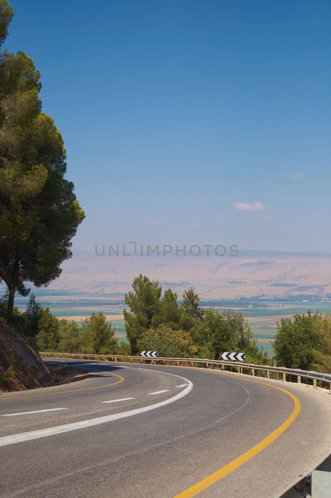 A view of an empty highway road .