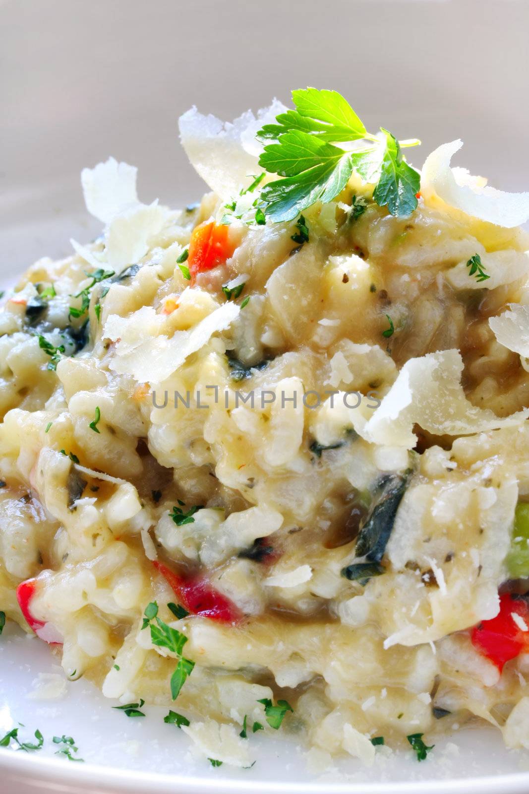 Chicken and garlic risotto, with shaved parmesan and parsley.