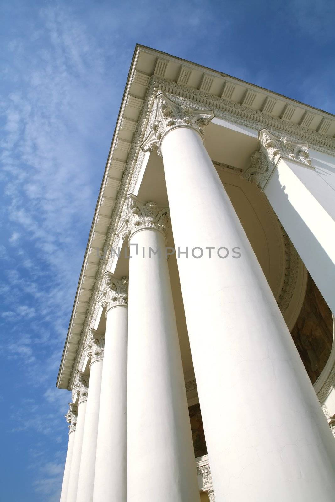 Moscow, Russia, Architecture, History Building with White Pillar on Background Blue Sky