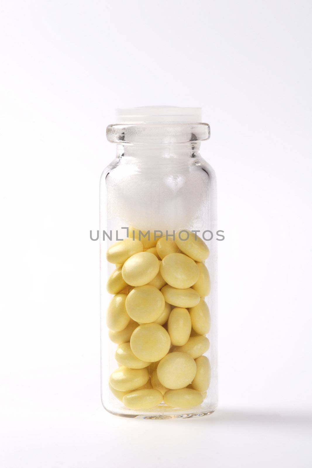 Yellow Capsules with Medicament in Vial