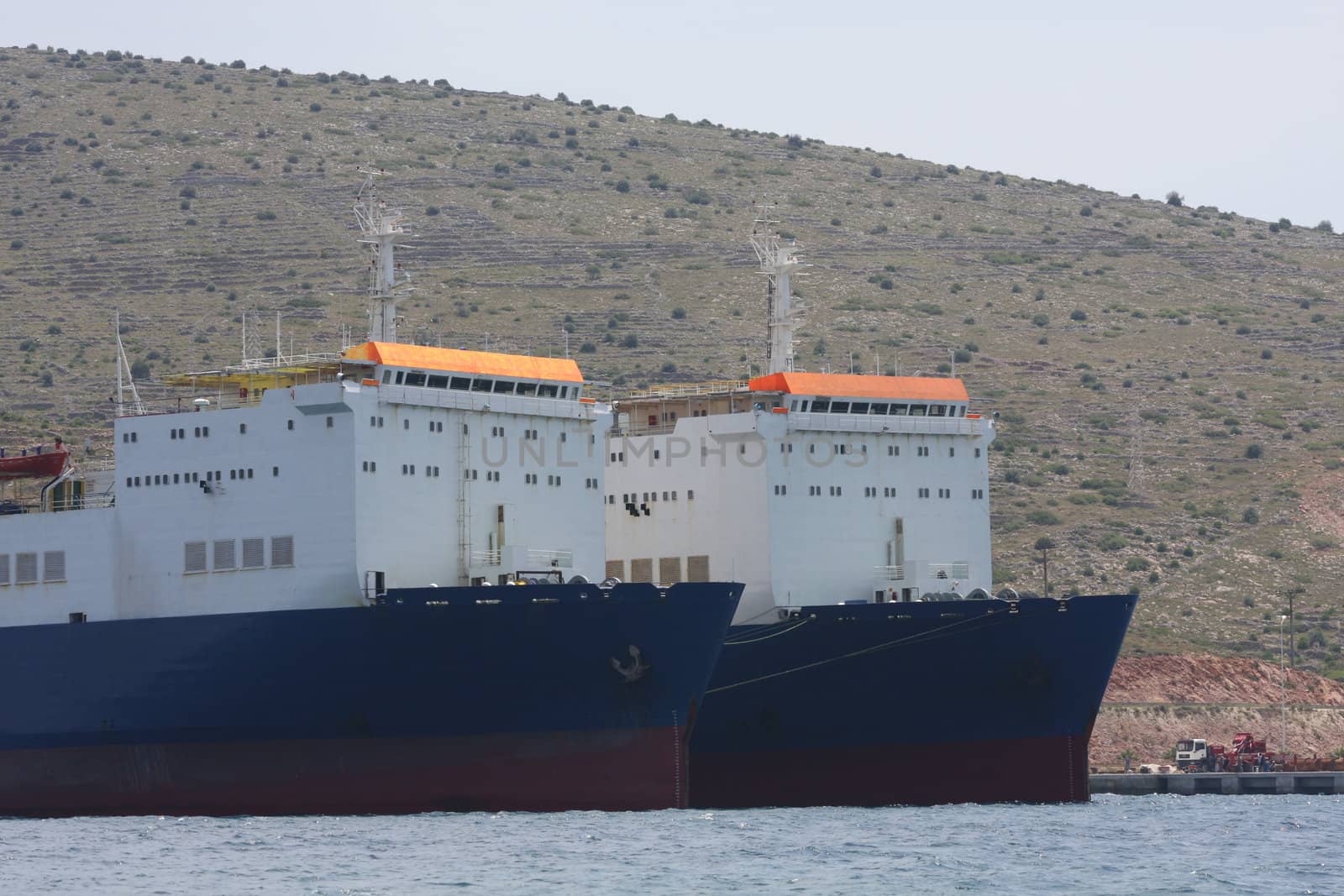 Cargo Ships anchored side by side in the harbour at Cesme, Turkey