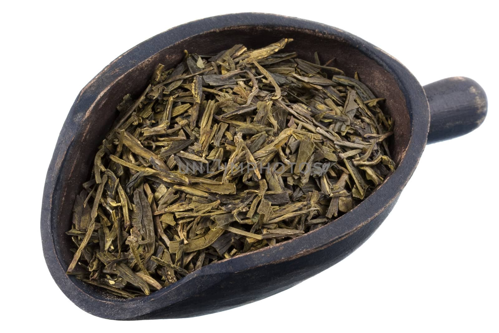 scoop of full leaf loose green tea by PixelsAway