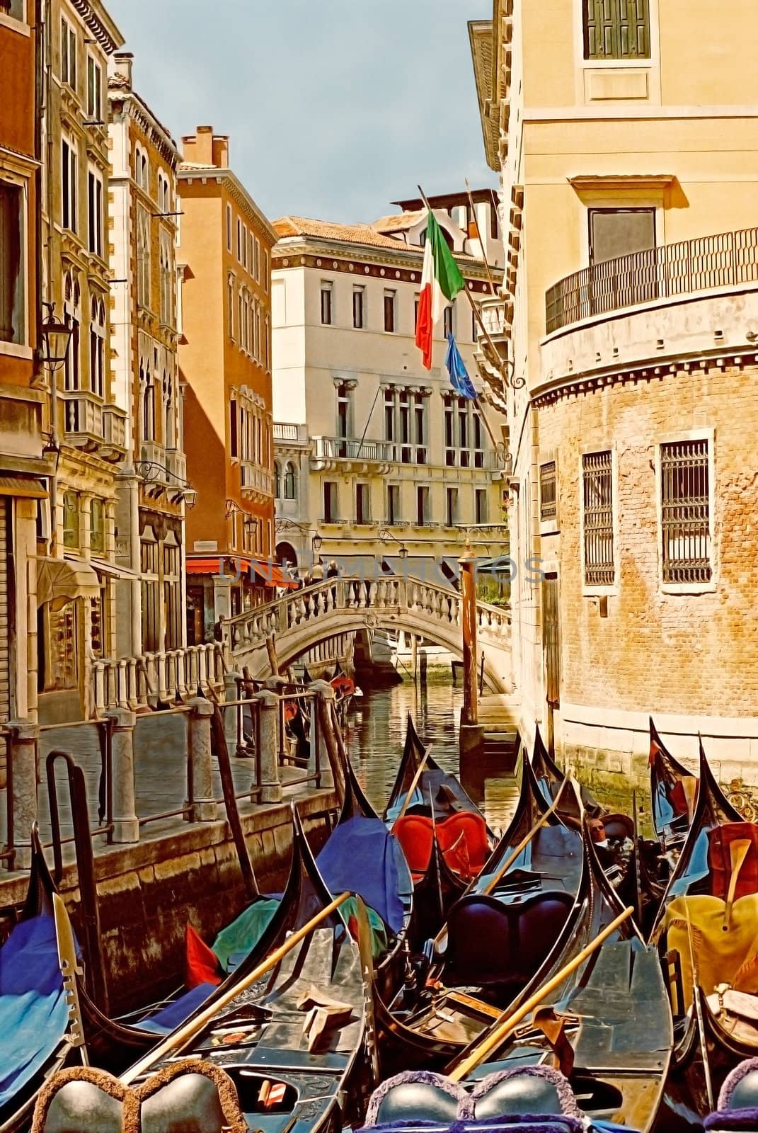 Unused gondolas ready for the tourists in the heart of Venice, Italy.