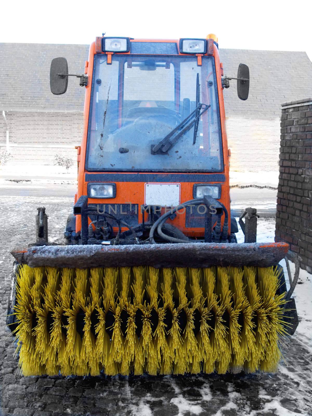 Winter - Snow sweeper tractor in  Denmark