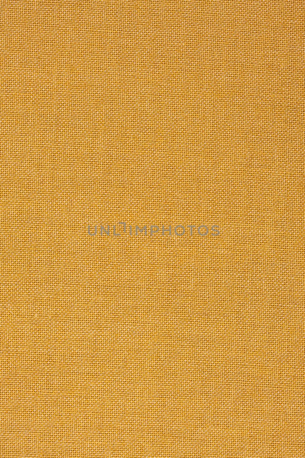 yellow, coarse textile background from a vintage 1960s book cover