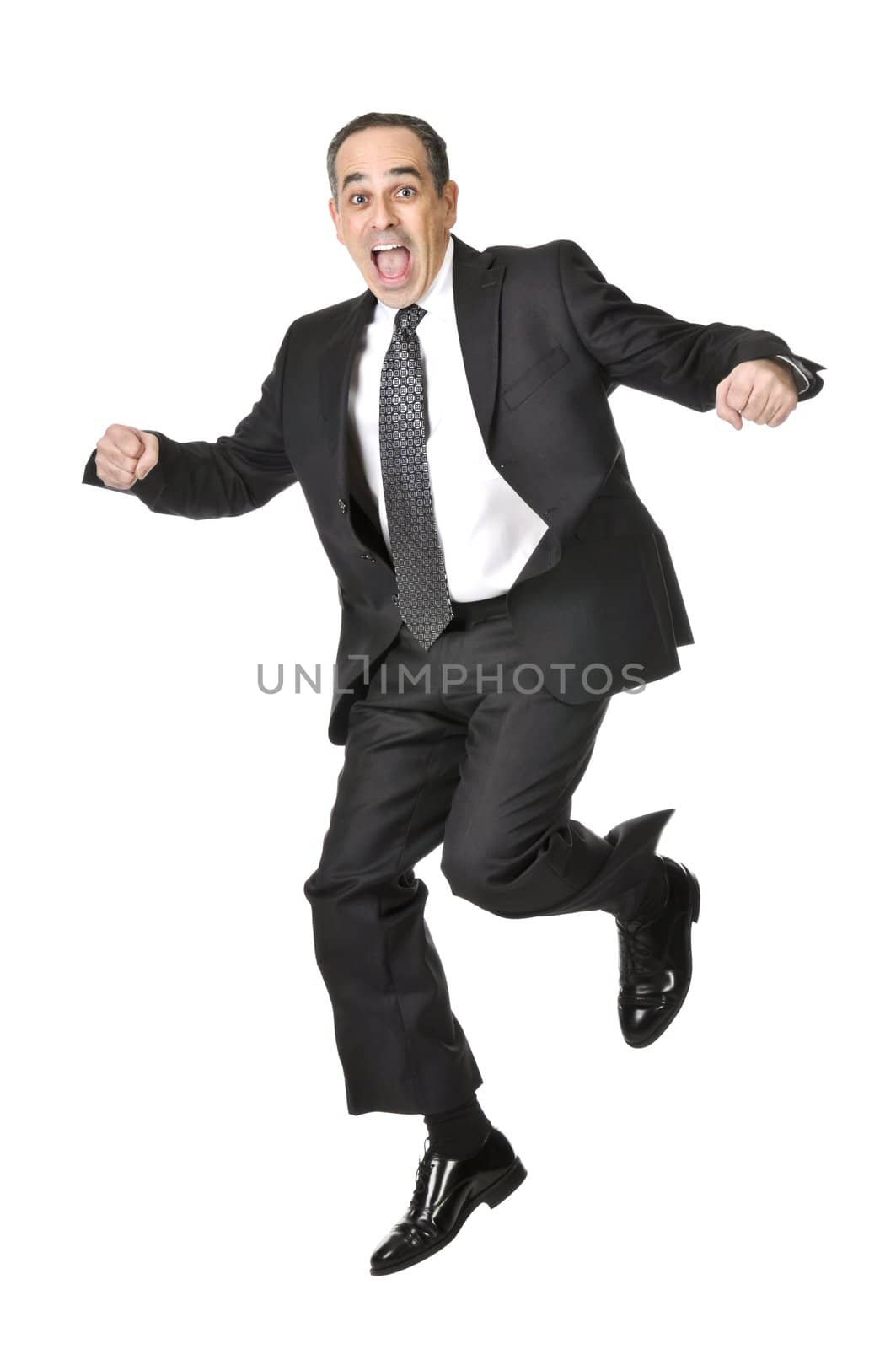 Jumping businessman in a suit isolated on white background