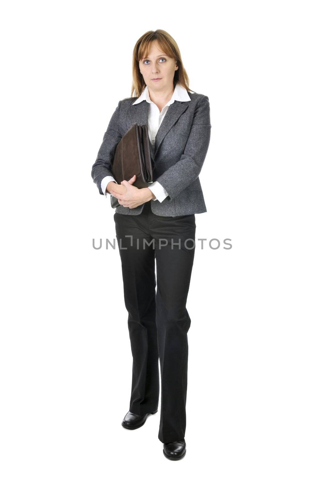 Serious businesswoman holding a portfolio isolated on white background
