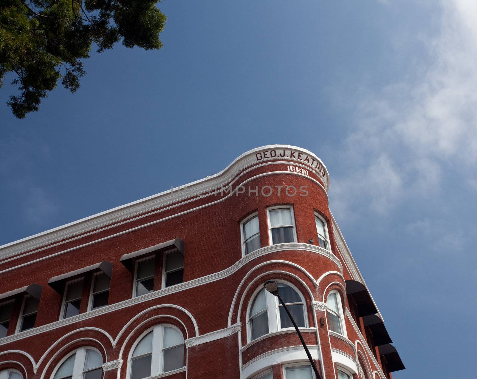 Gaslamp district of San Diego with the old Keating building set by ornate gas lamps