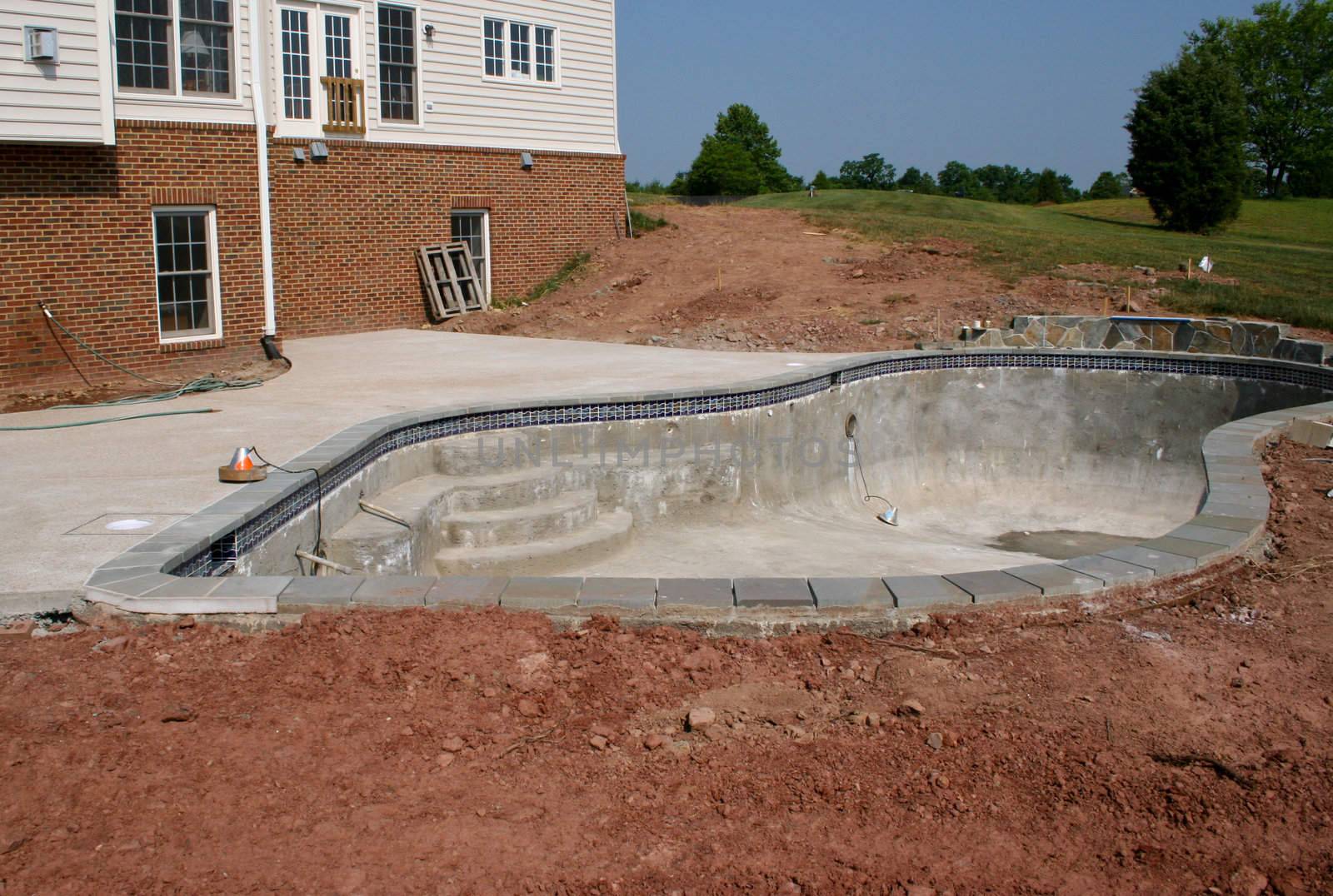 Creating a concrete swimming pool in residential back yard