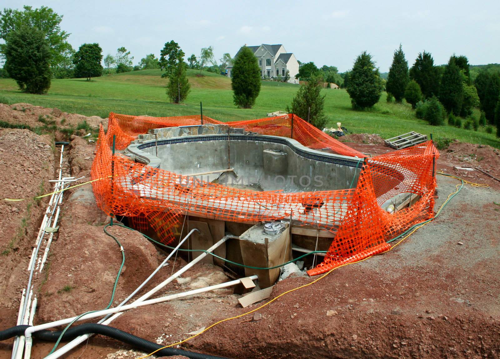 Creating a concrete swimming pool in residential back yard