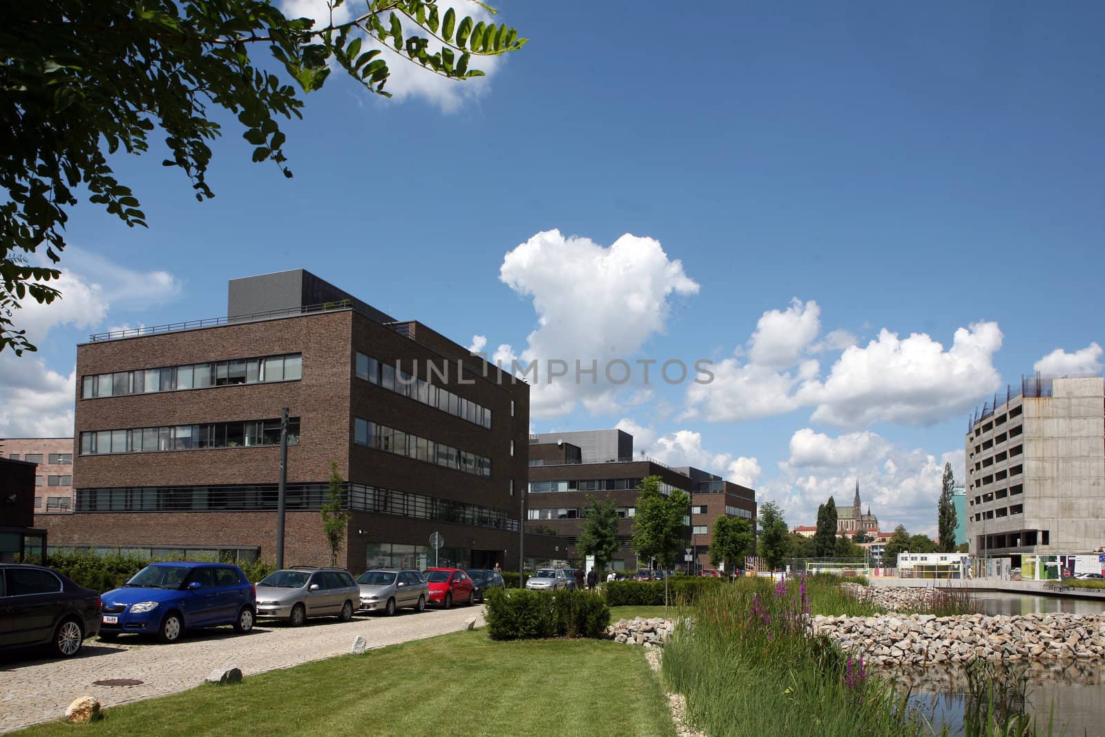 New modern futuristic buildings and blue skyes in cloudy day by haak78