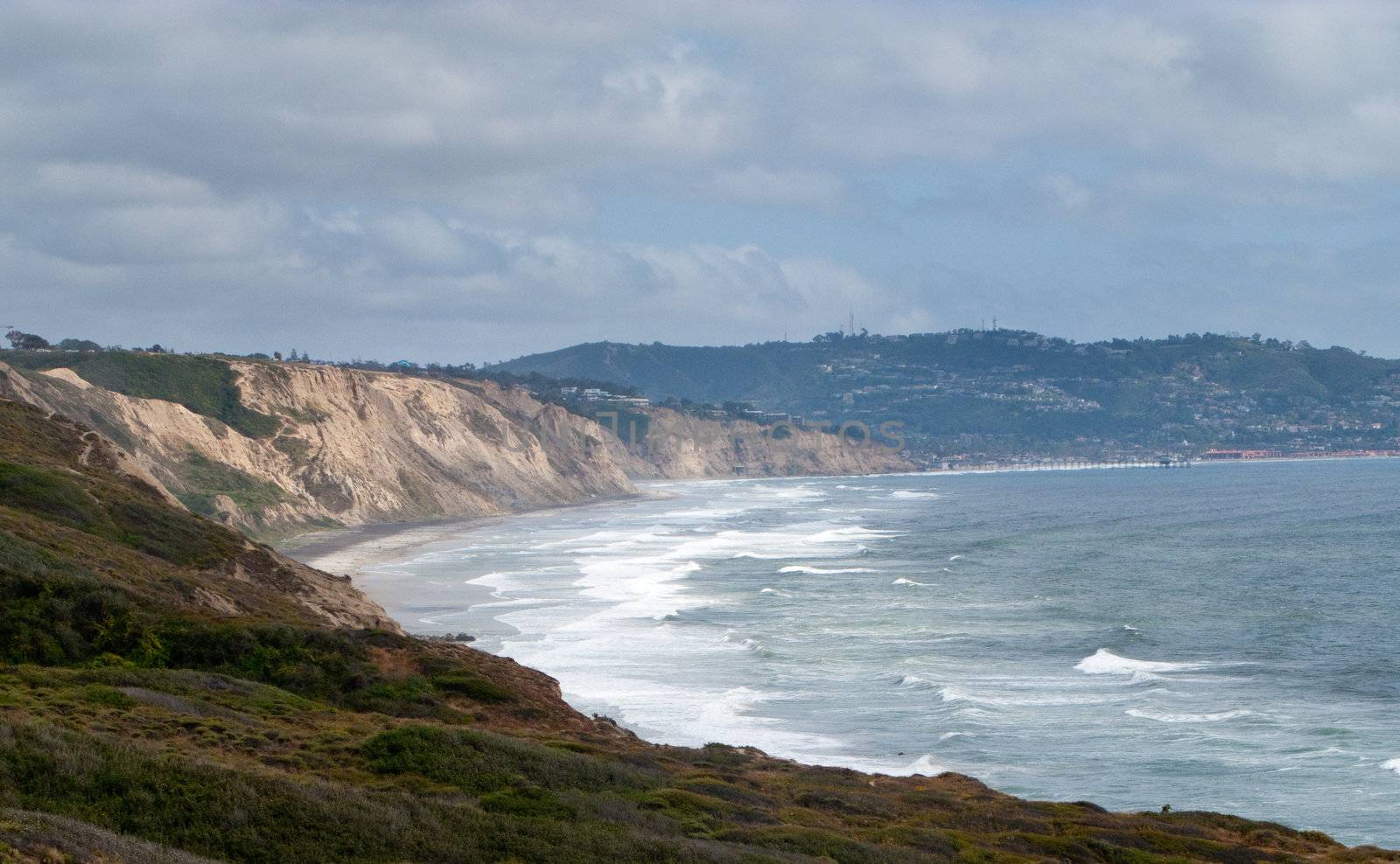 View down the cliffs and bay towards La Jolla in Southern California with Del Mar in the near distance