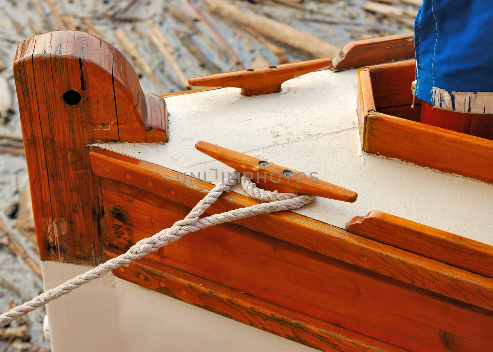 A sailboat rope tie down at a boat dock.