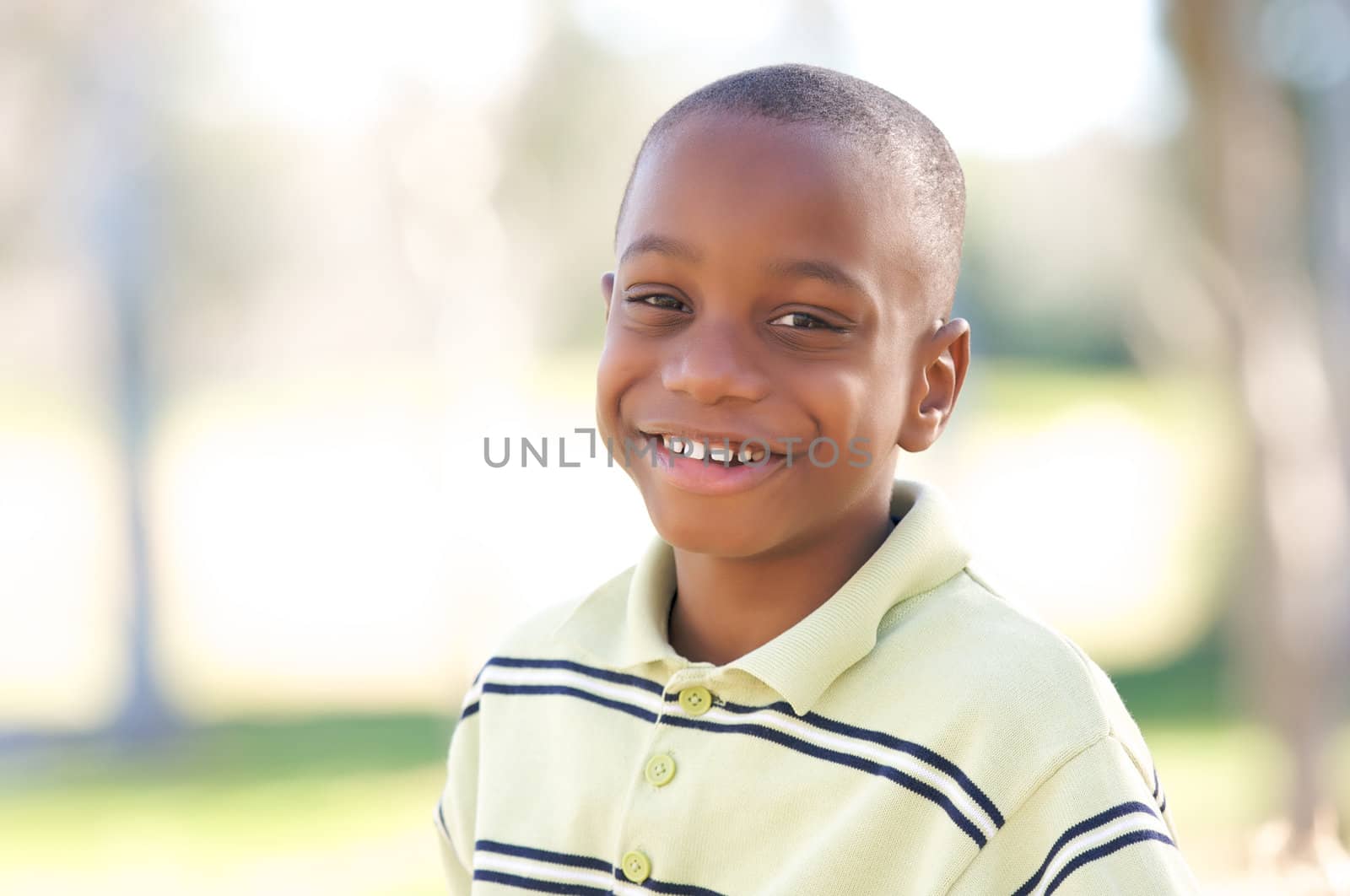 Young Boy Having Fun In The Park