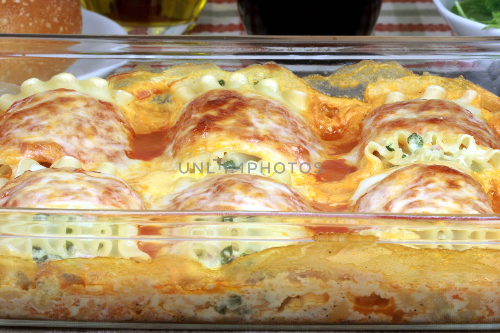 italian lasagna rolls made with tomatoes spinach and ricotta cheese  