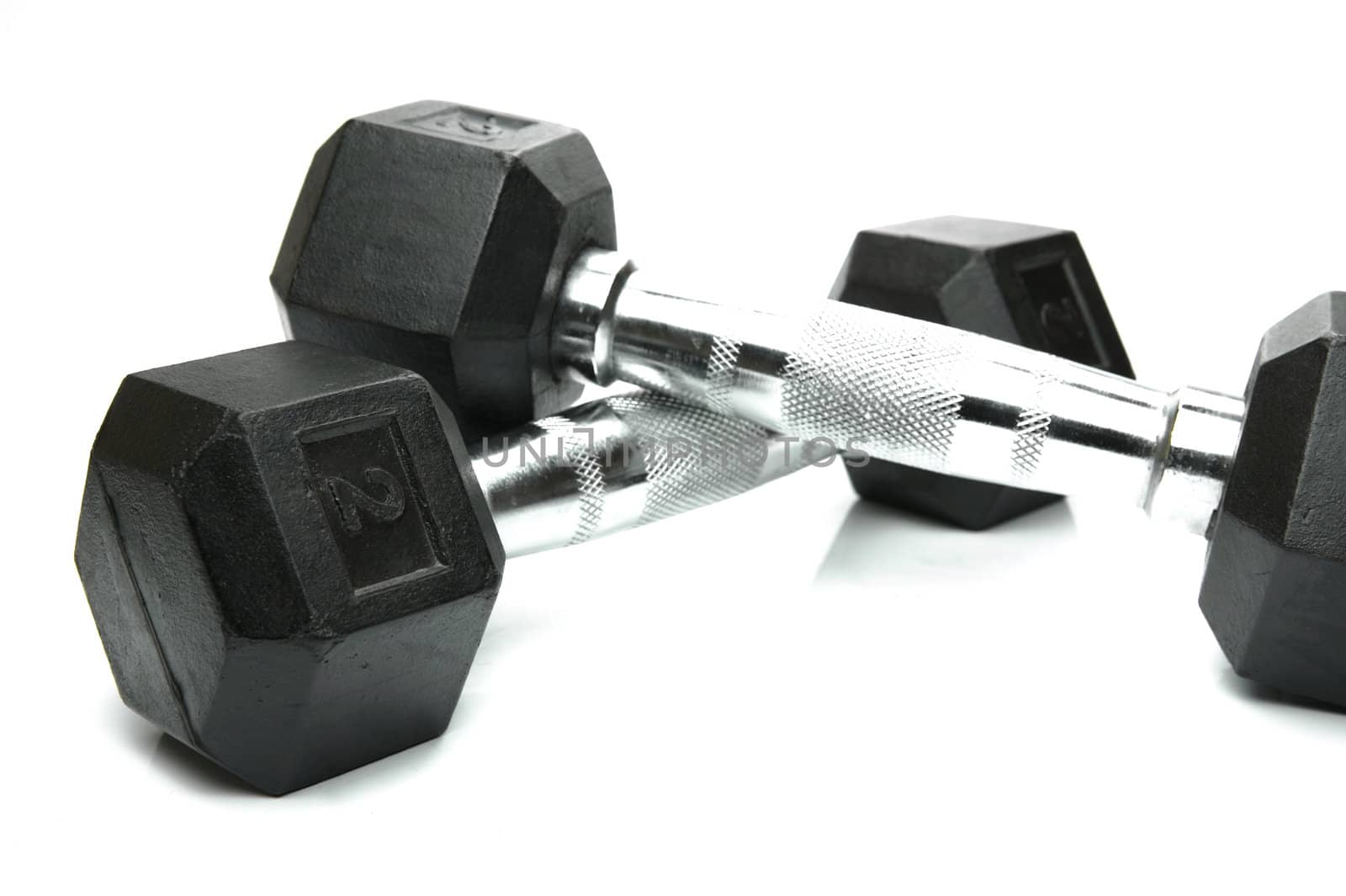 Weight lifting dumbbells isolated against a white background