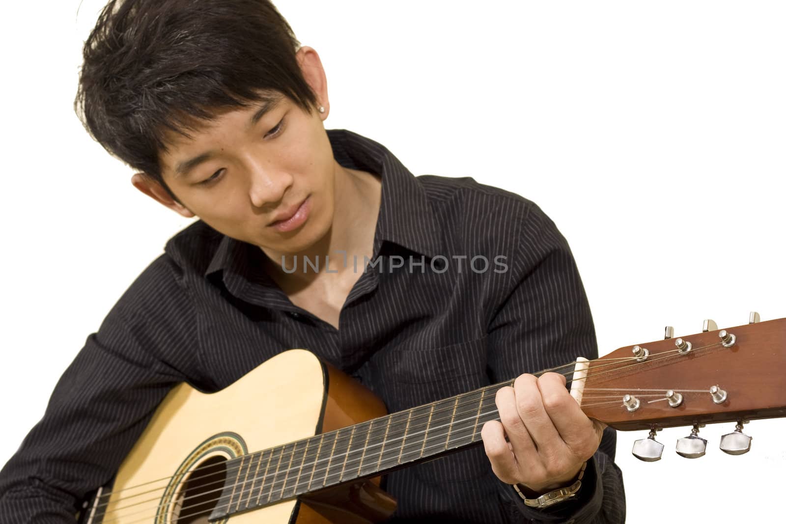 asia boy plays his guitar  by cozyta