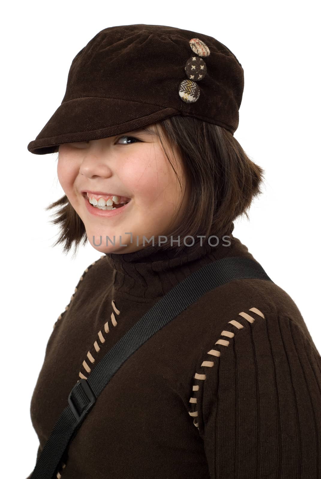 Portrait of a smiling preteen, isolated against a white background