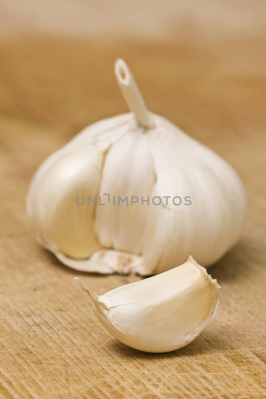 Garlic on a wooden cutting table