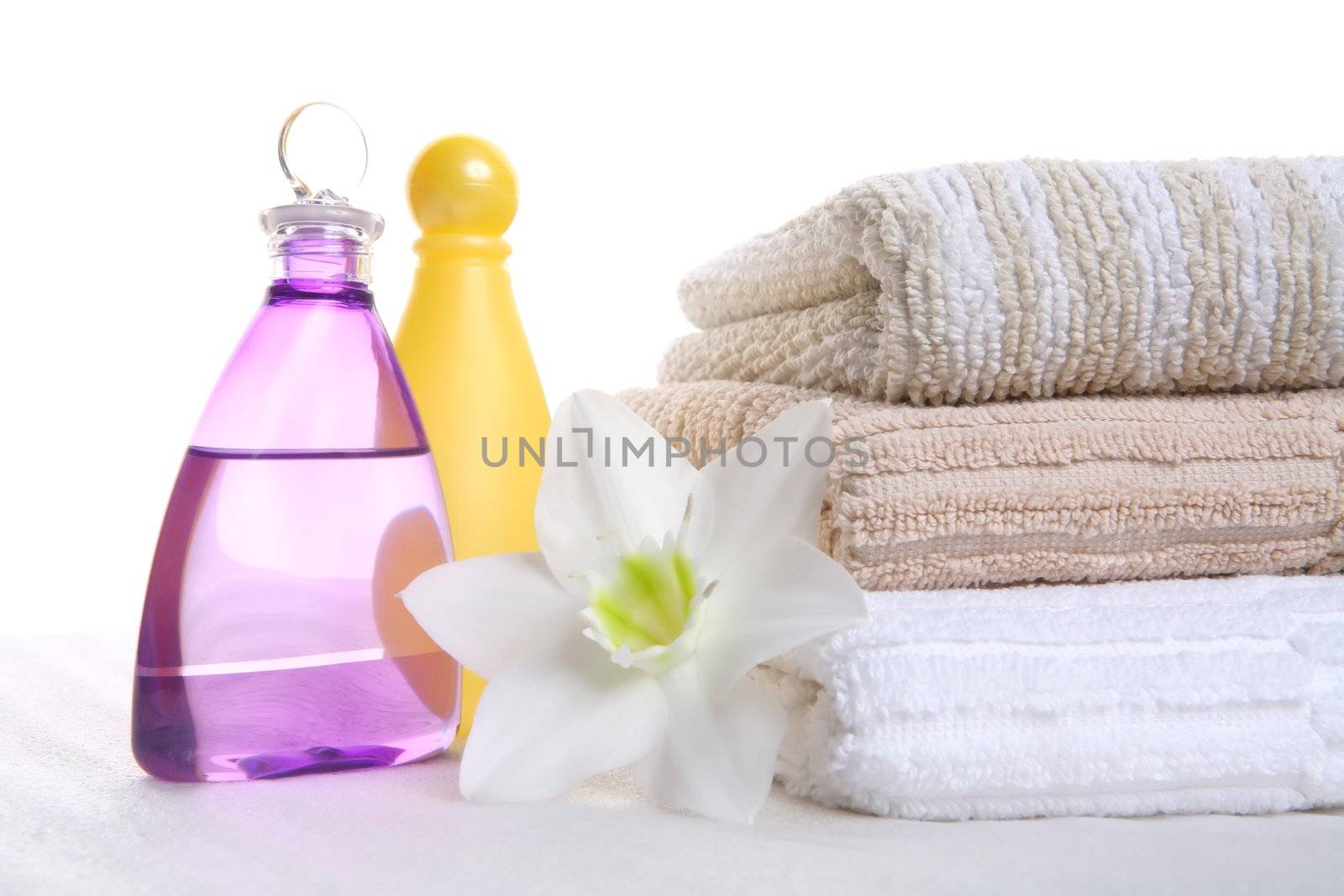 hygienic still-life, aromatic oil, shampoo and towel, aromatic therapy