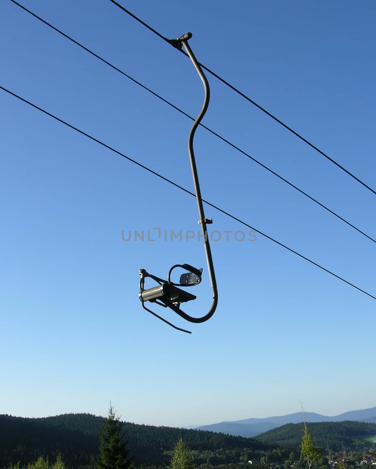 Chair-lift and the blue sky