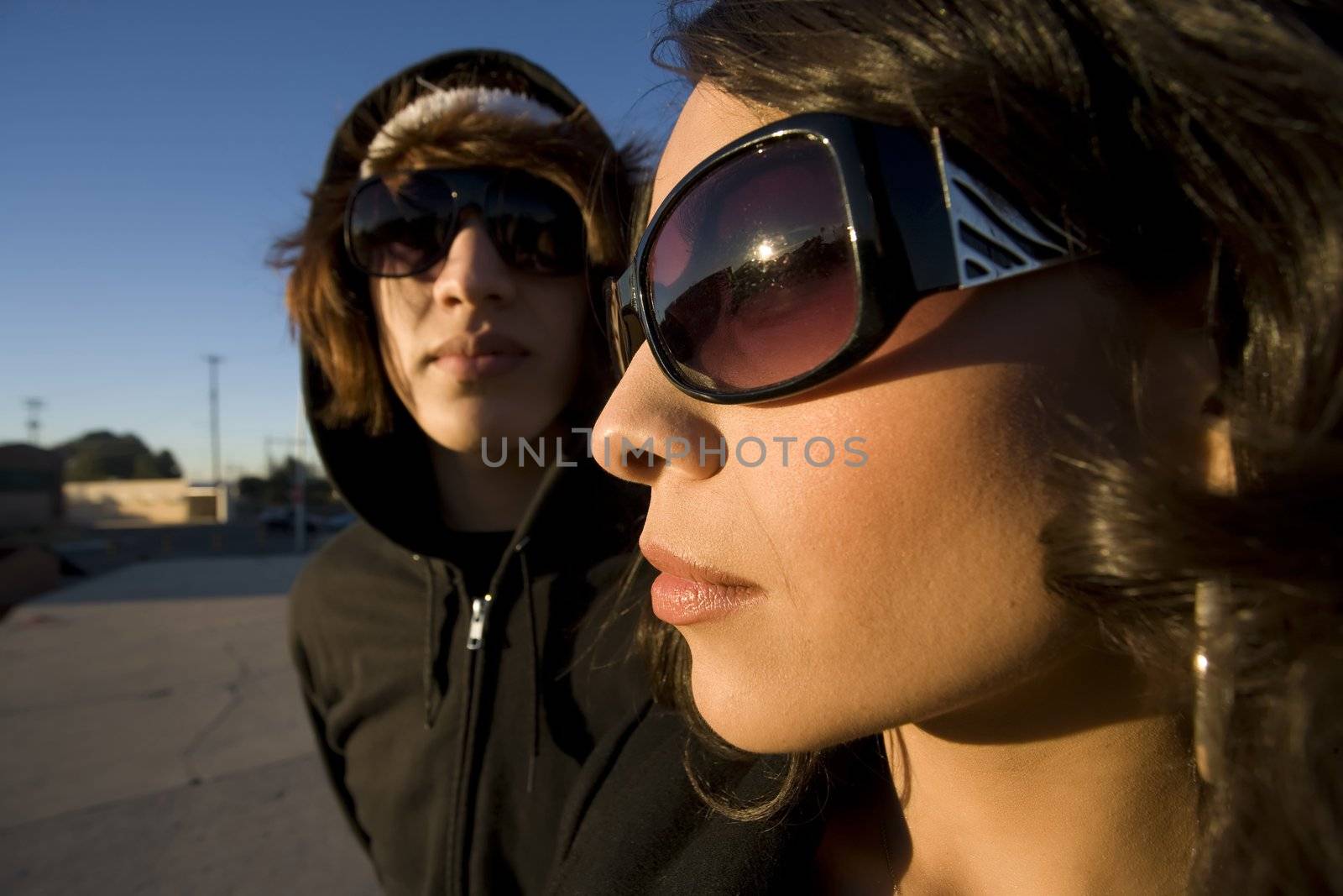 Beautiful woman and handsome young man in an urban setting