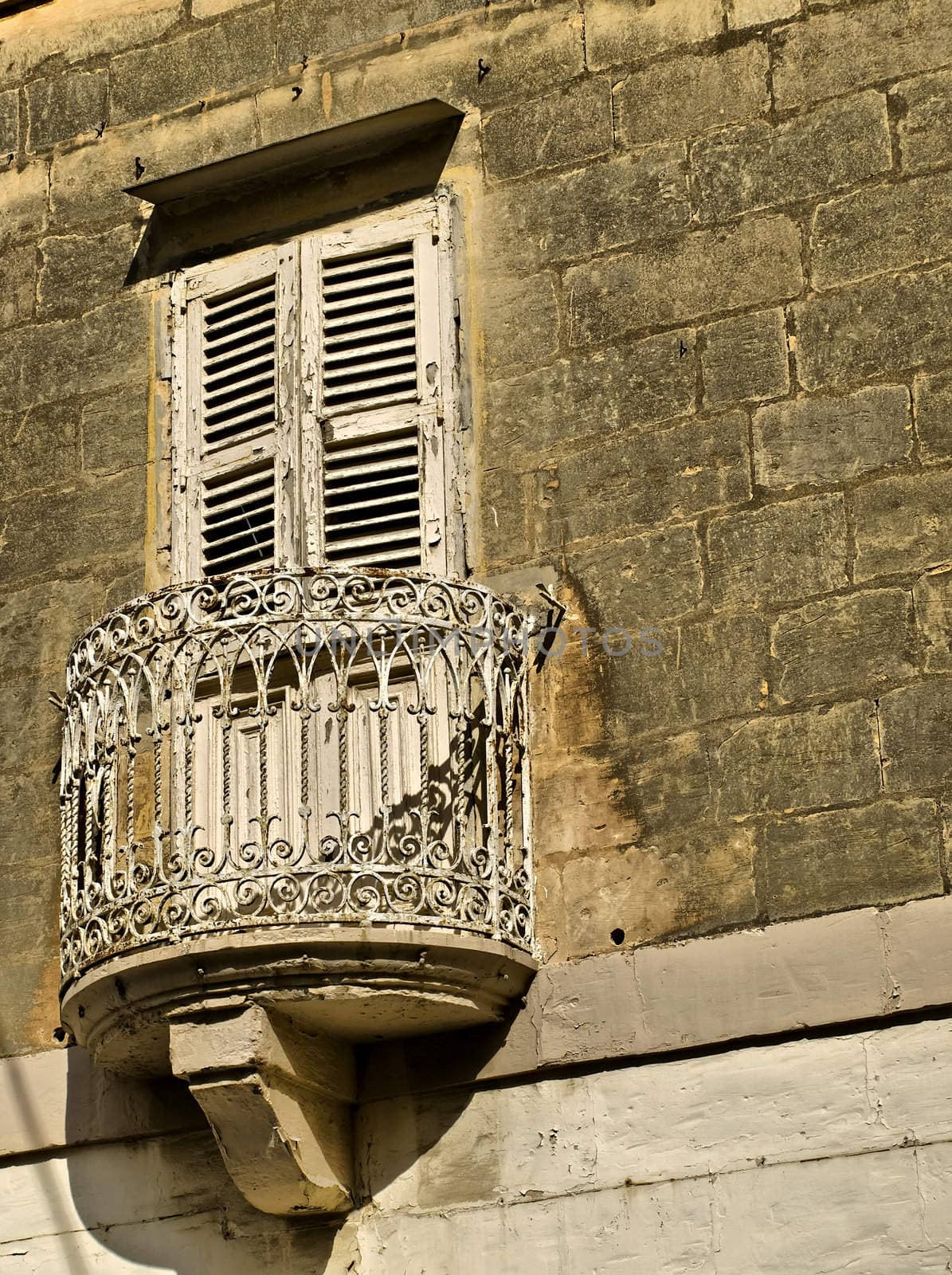 Typical features on a facade of a house in Malta 