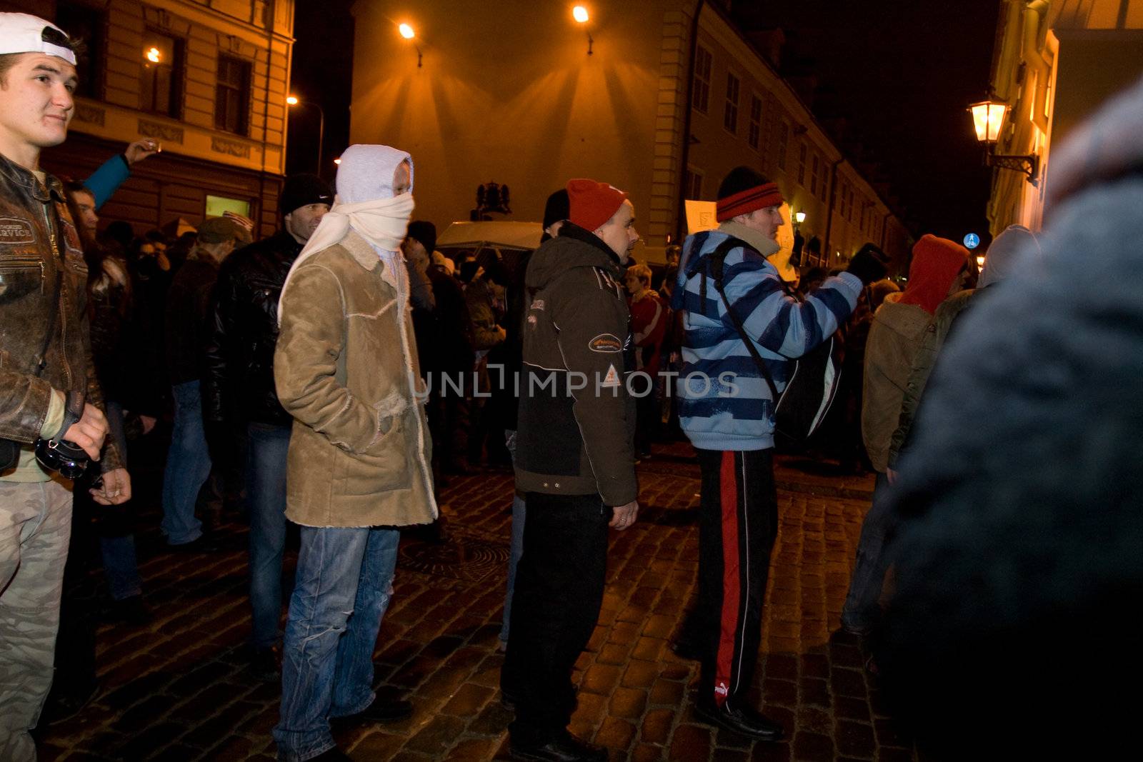 Agresive crowd and police near Latvian Parliament. Riga, Latvia, January 13, 2009