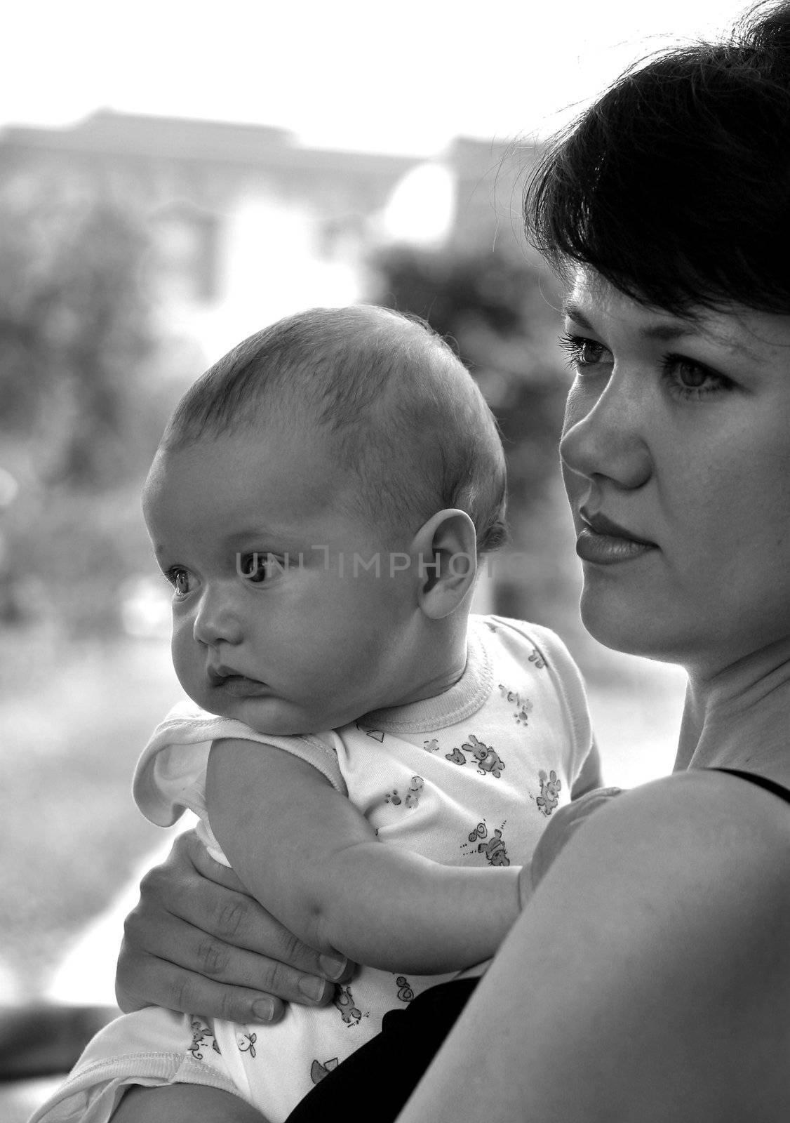 Happy mum and her child in park