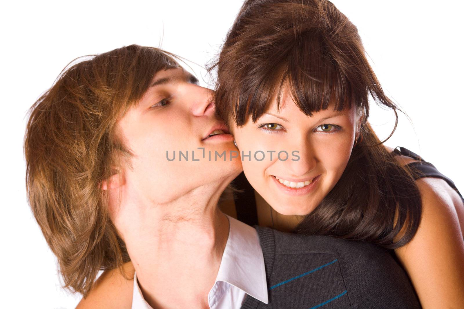 Young beautiful teenage couple sharing a secret