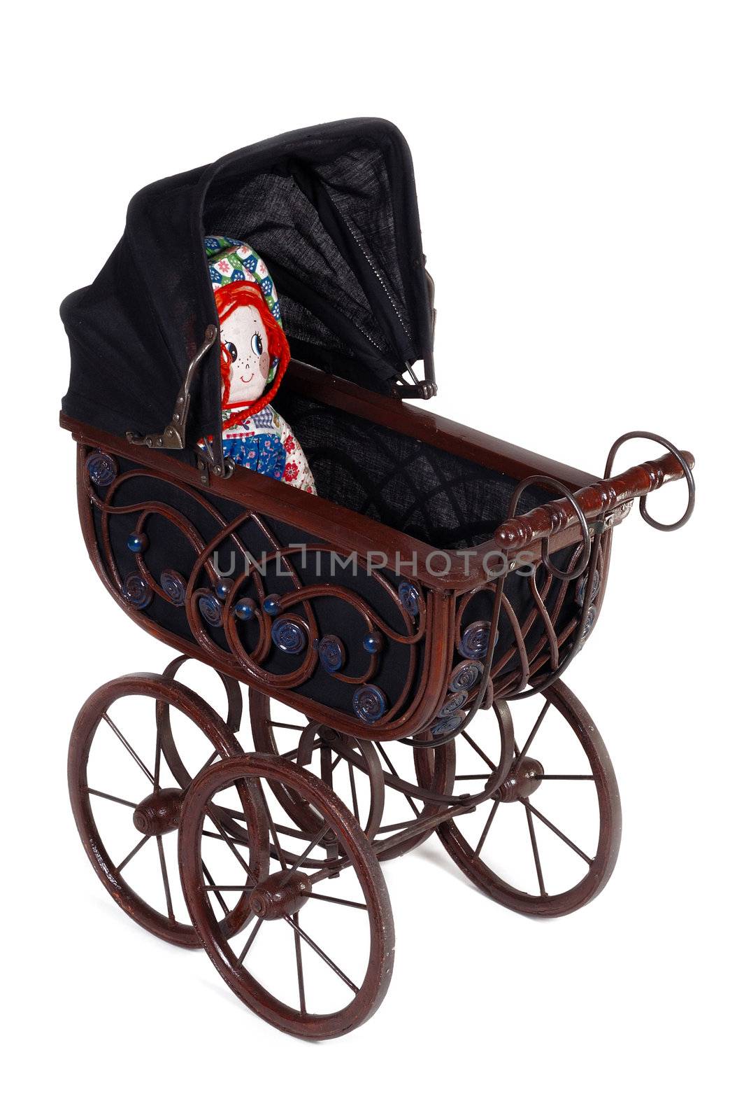 Old fashioned stroller. Taken on white background.