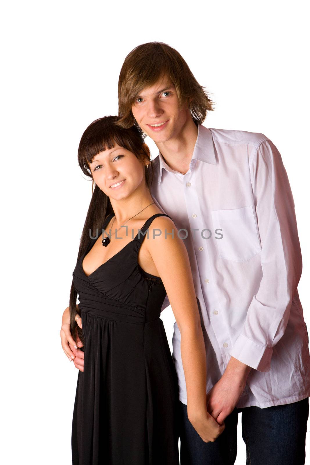 Young beautiful teenage couple isolated on white