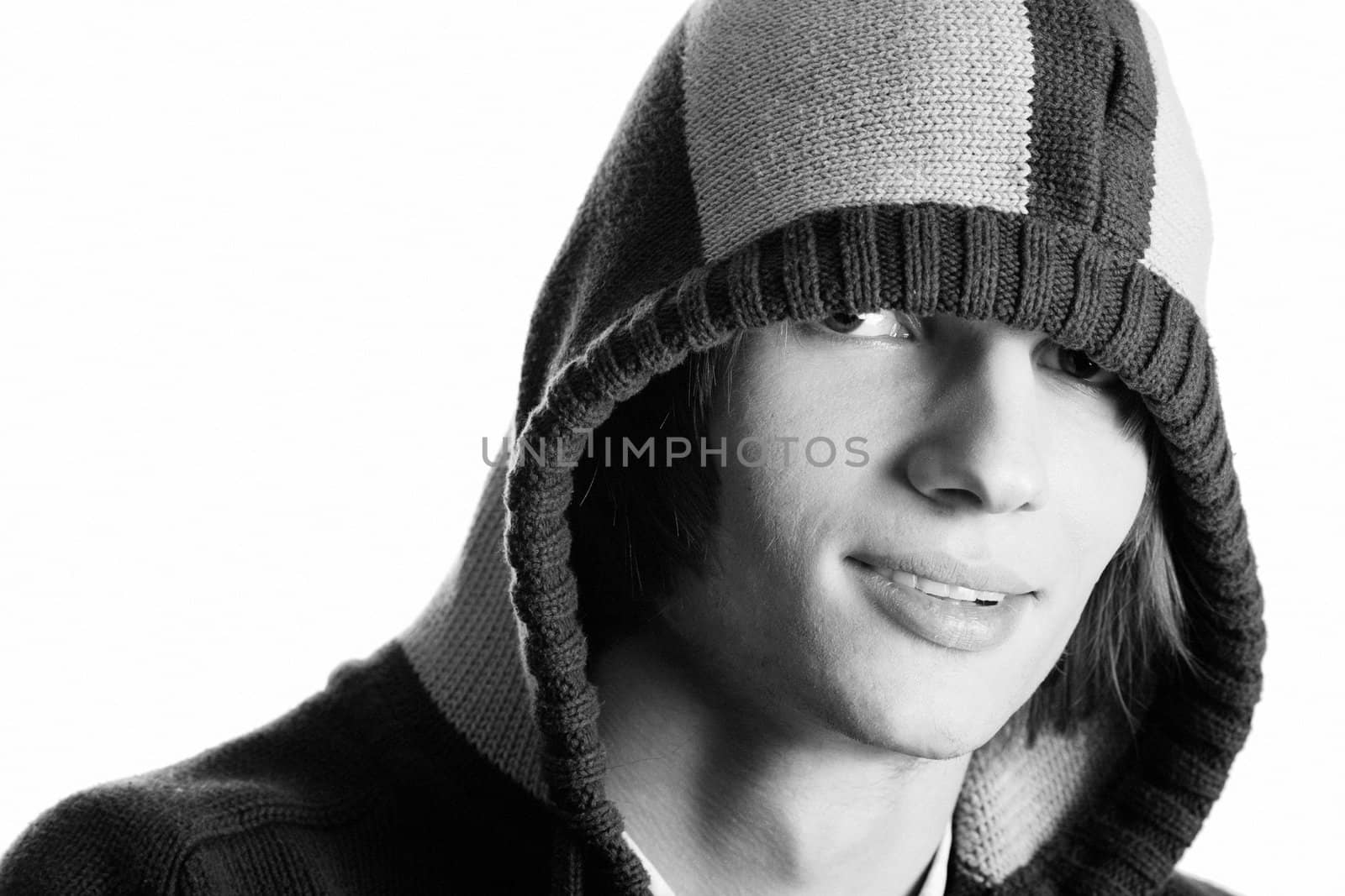 Young handsome man wearing hood isolated on white