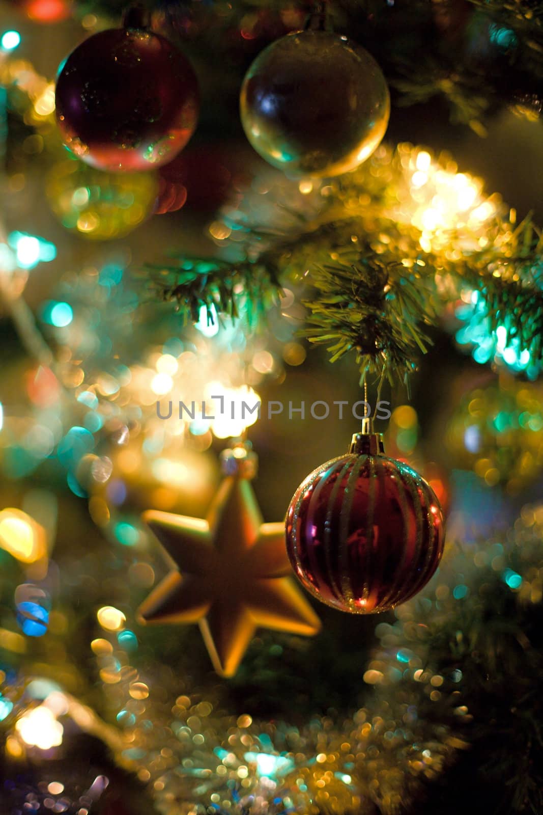 Christmas tree decorations with lights close up