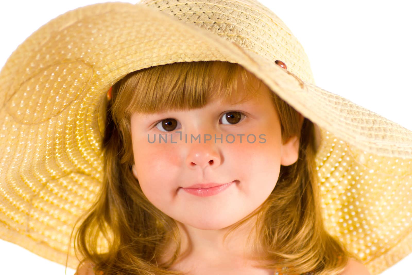 Portrait of little girl wearing straw hat