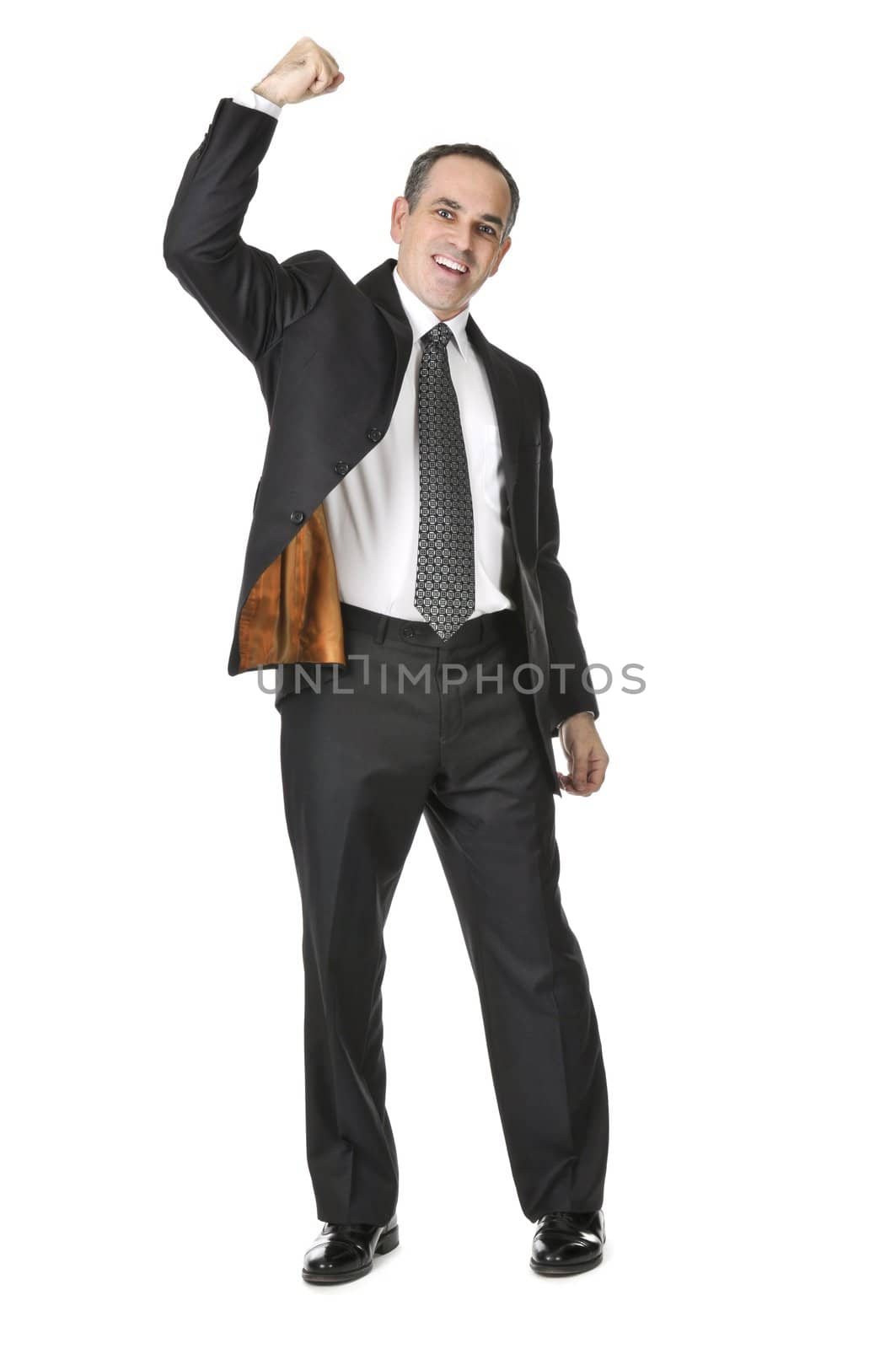 Triumphant businessman in a suit isolated on white background