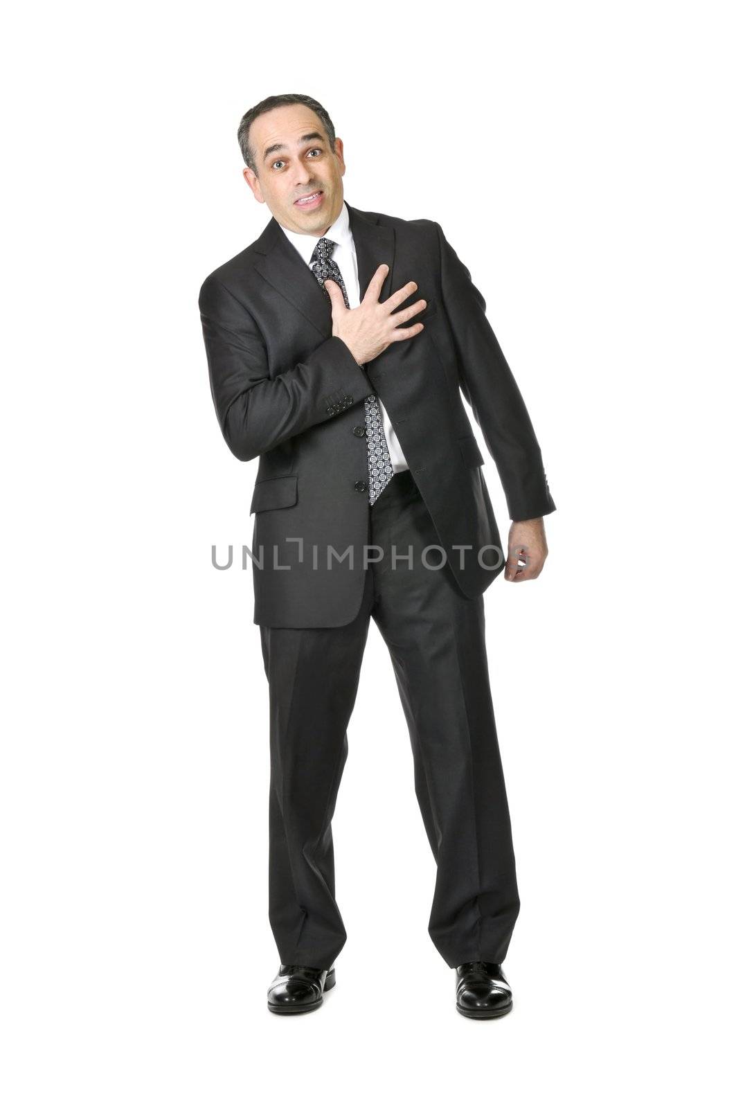 Businessman in a suit pretending to have a heart attack isolated on white background