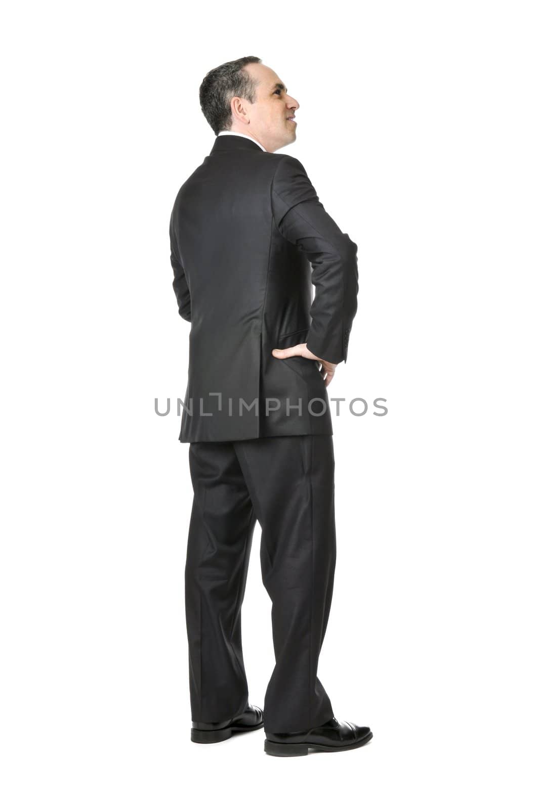 Happy businessman in a suit isolated on white background