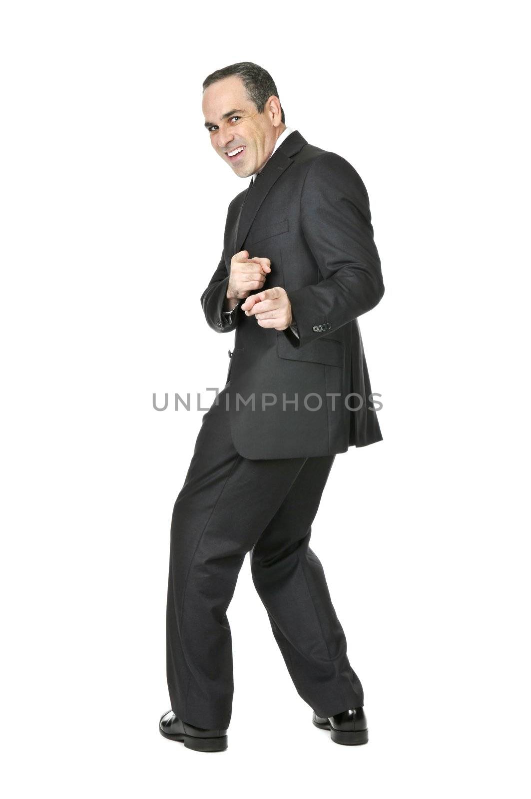 Happy businessman in a suit pointing at the viewer isolated on white background