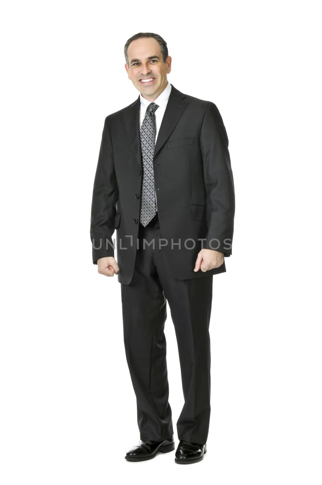 Happy businessman in a suit isolated on white background