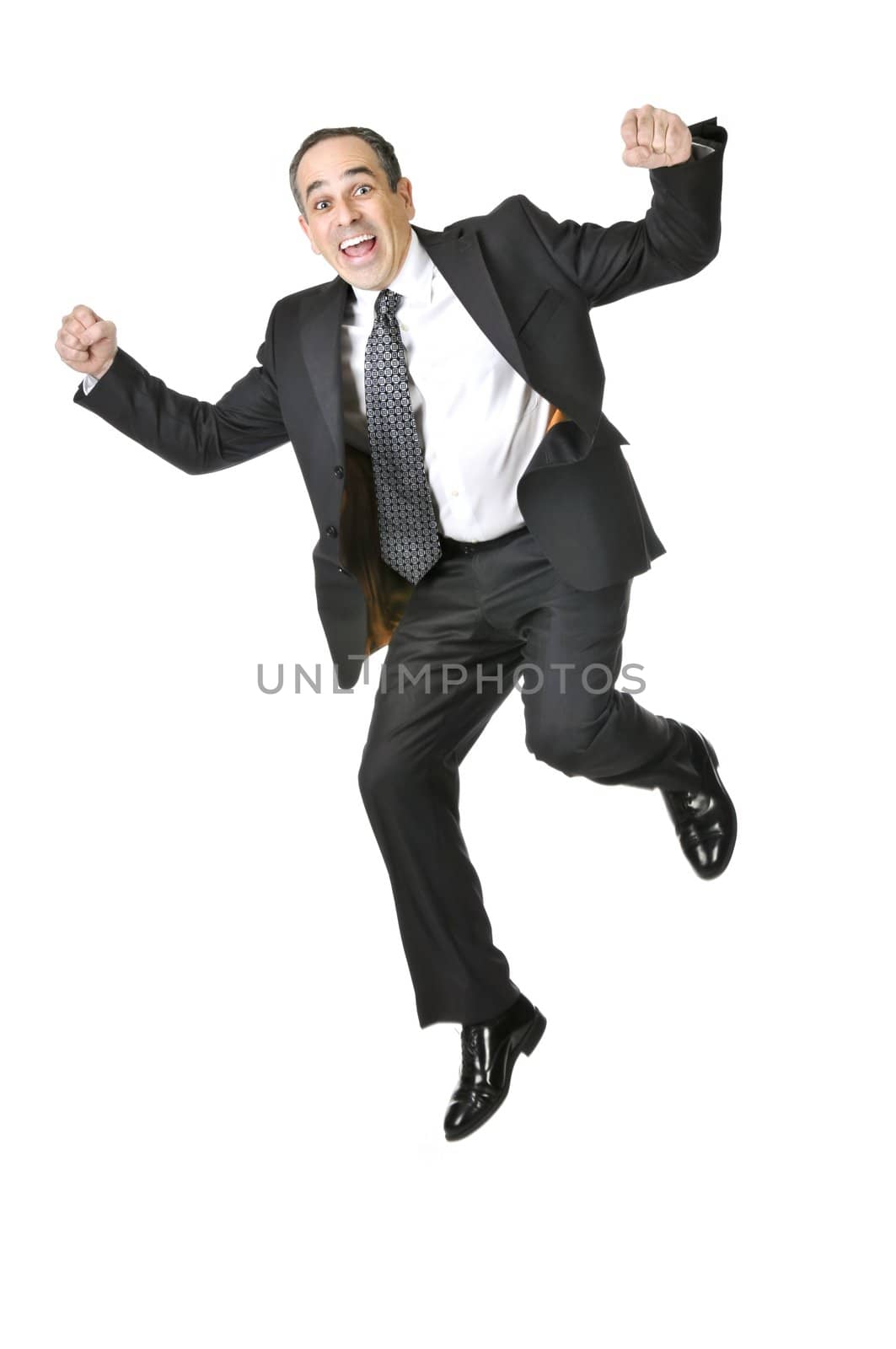 Jumping businessman in a suit isolated on white background