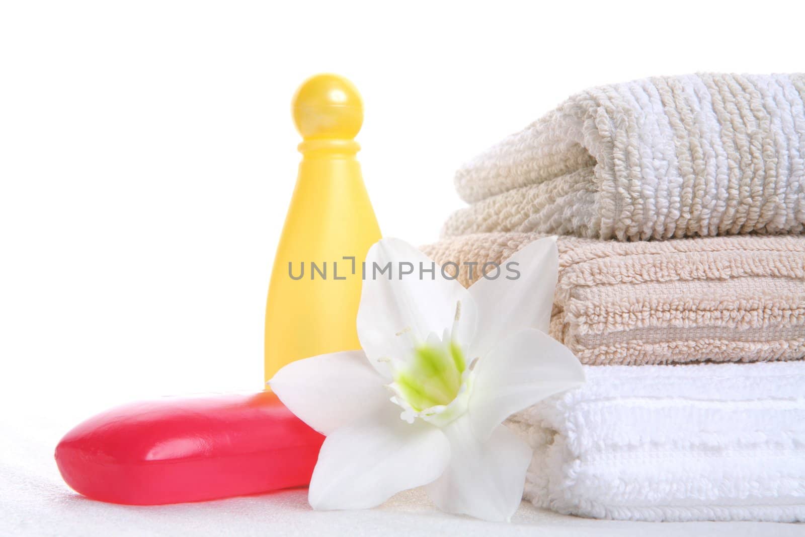 still life with red soap and yellow vial, aroma and freshness