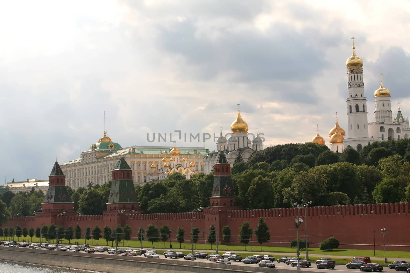 Russia, Moscow, Red Kremlin Wall with Tower and Orthodox Temple on Territory Flint