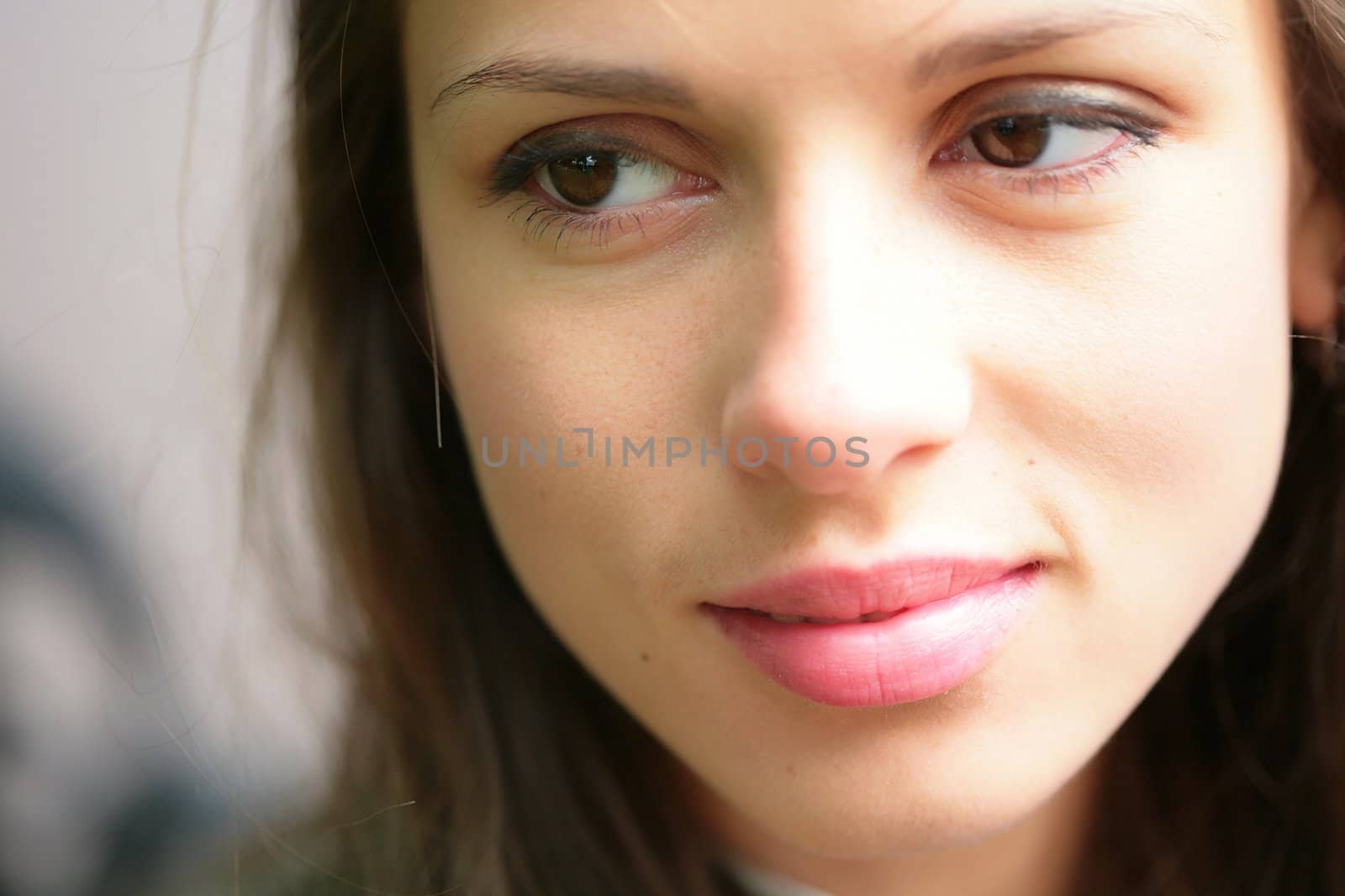 close-up portrait of the beautiful young girl with brown eye