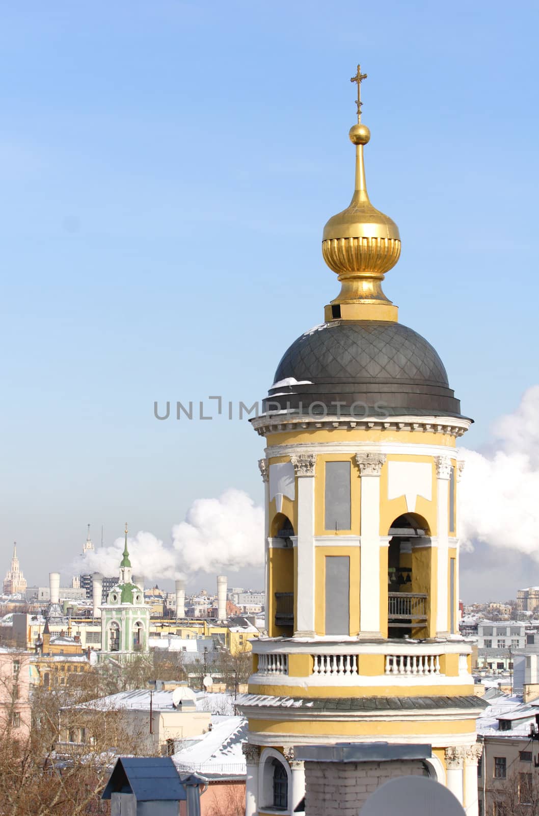 Moscow, Russia, Dome, Spire and Bell tower of the Orthodox Temple in Zamoskvorechie at Solar Day