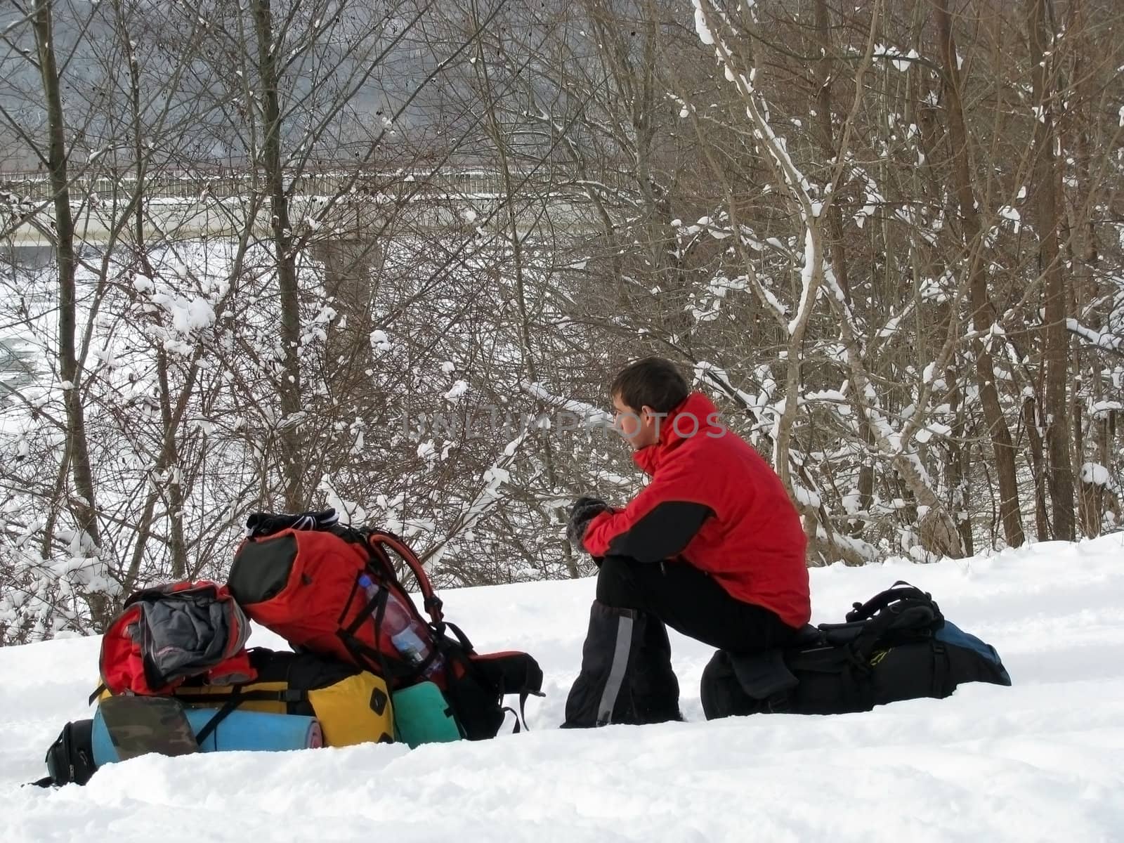 Winter, lad looks halt, march, snow, tourist, expedition, tree, rucksacks, bridge, river, nature, journey, road, type
