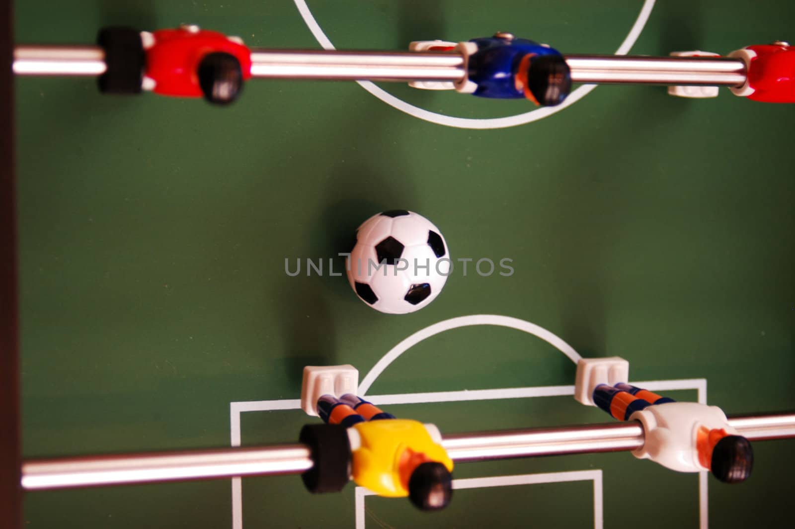 rolling ball on a foosball table