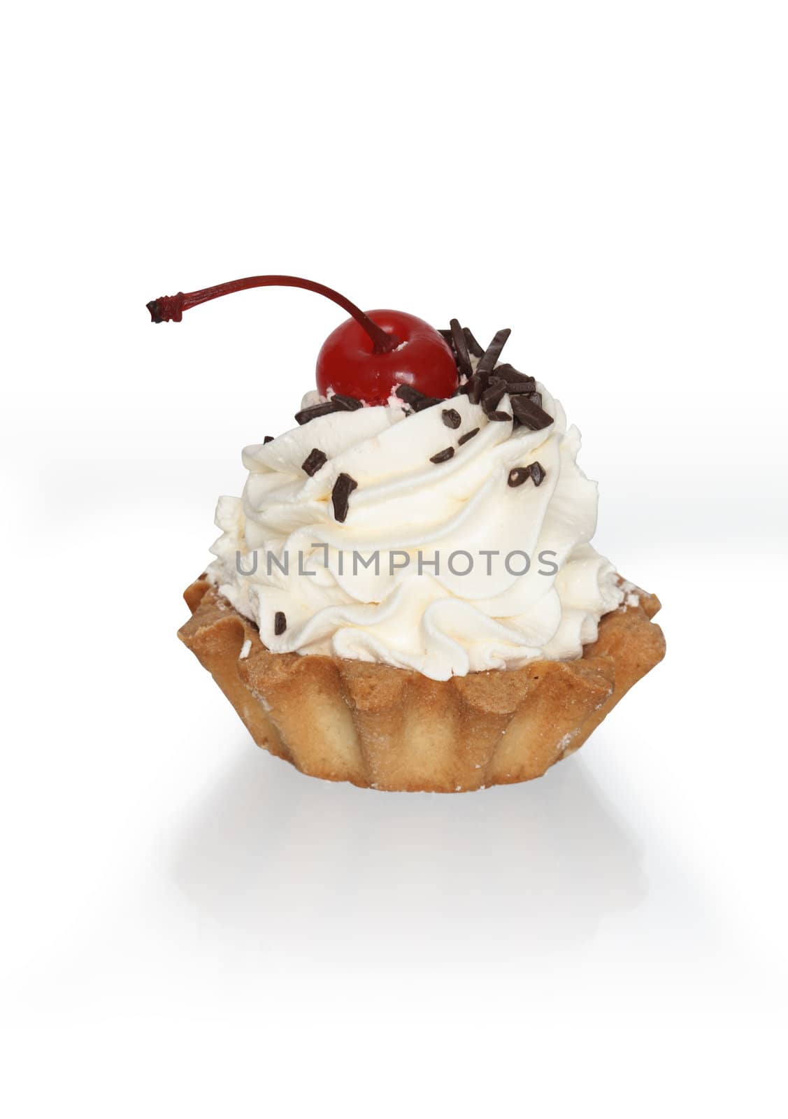 Nice tart with cream and cherry berry. Isolated on white with clipping path