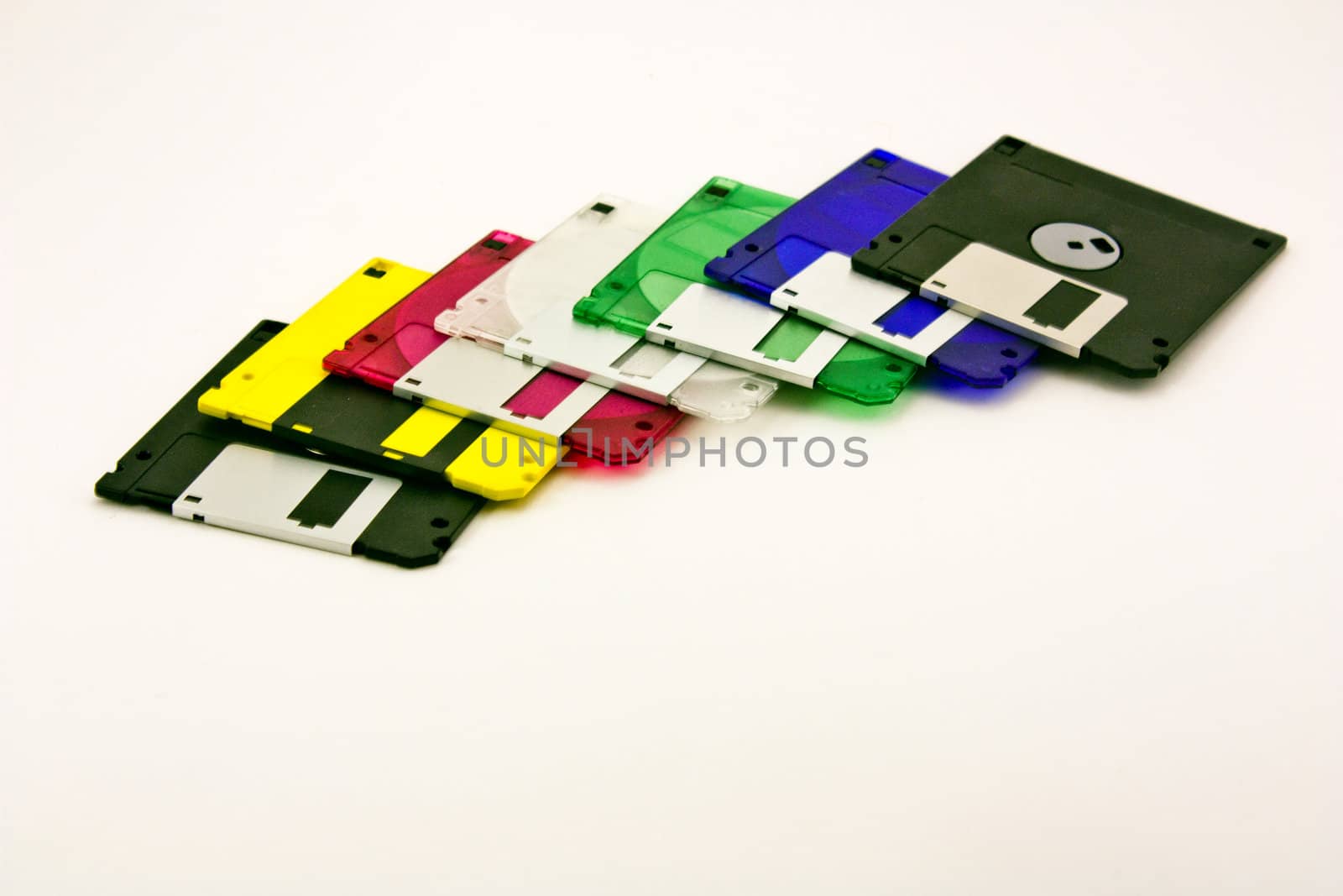 pile of floppy disks of different colors