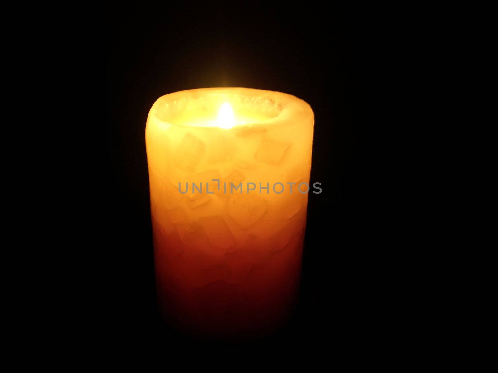 soft candle light on black background